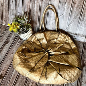 Jessica Simpson Gold Flower handbag